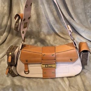 Pink canvas Dior handbag.